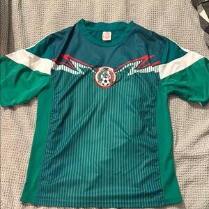 Green and White Soccer Jersey with Diagonal Stripe and Lightweight Fabric